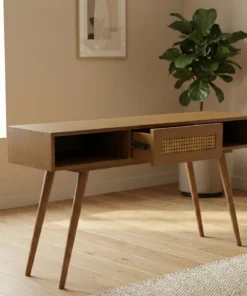 The Antigua Caned Desk - Airy textures. Architectural grounding